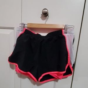 Black and pink running shorts